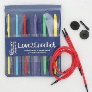 May include: A set of six interchangeable crochet hooks in a plastic case, with a red cord and two black connector pieces. The hooks are labeled "Denise Interchangeable Crochet Hooks" and "Love2Crochet". The sizes are US F5/3.75mm to J10/6mm.
