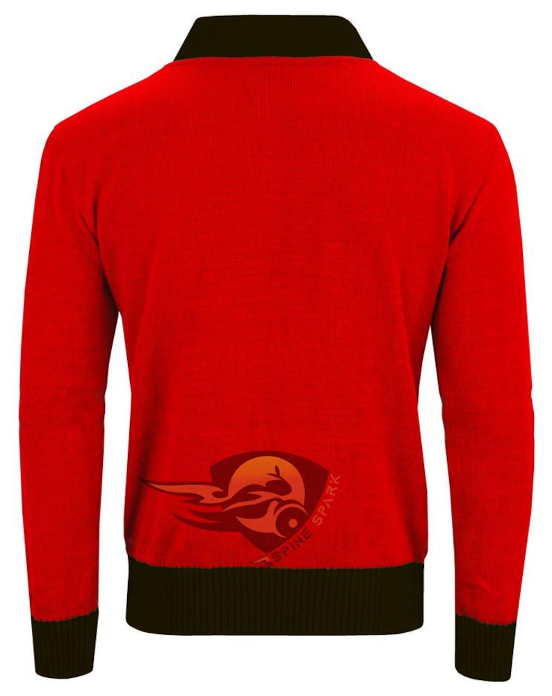 May include: A red long-sleeved sweater with a black collar, cuffs, and hem. The back of the sweater features a logo with a stylized flame and the words "SPINE SPARK". The sweater is made of a ribbed knit fabric.