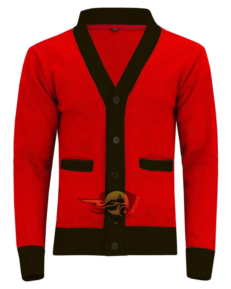 May include: A red cardigan sweater with black trim on the collar, pockets, and button placket. The sweater has long sleeves and a ribbed hem and cuffs. The sweater has a logo on the lower right side. The sweater has five buttons.
