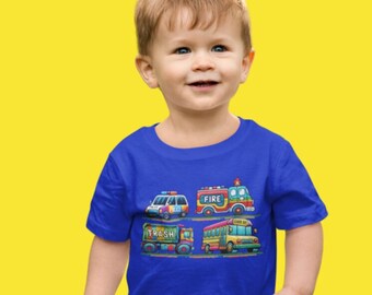 May include: A toddler wearing a royal blue t-shirt with a colourful graphic of four vehicles: a police car, a fire engine, a refuse truck, and a school bus. The vehicles are arranged in a row and have the words "FIRE", "TRASH", and "SCHOOL" written on them.
