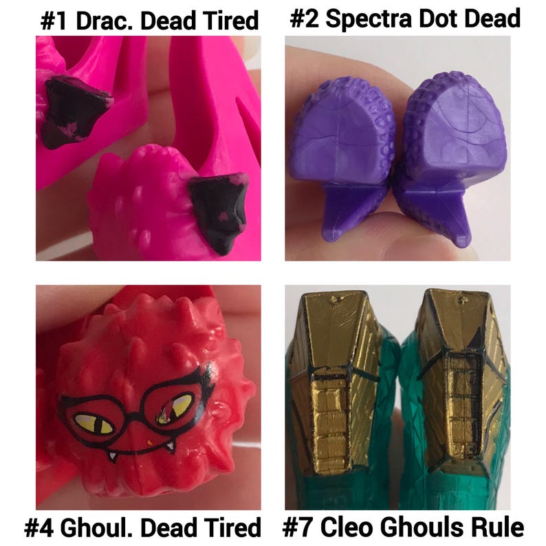 May include: Four pairs of miniature doll shoes labeled #1 Drac. Dead Tired in bright pink, #2 Spectra Dot Dead in purple, #4 Ghoul. Dead Tired in red with a black glasses graphic, and #7 Cleo Ghouls Rule in teal with gold-colored heel accents.