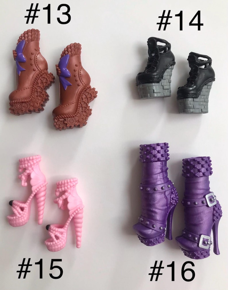 May include: Four pairs of doll shoes labeled #13, #14, #15, and #16. Pair #13 is brown with purple bows. Pair #14 is black with gray brick-patterned platforms. Pair #15 is light pink with spiral heels. Pair #16 is purple with studs and silver buckles.