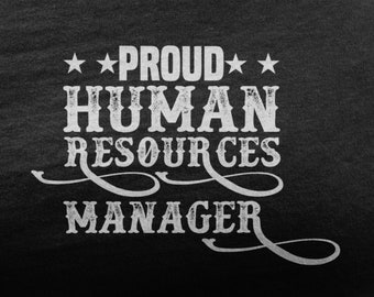 May include: A black t-shirt with white text that reads "**PROUD** HUMAN RESOURCES MANAGER" in a vintage style font.