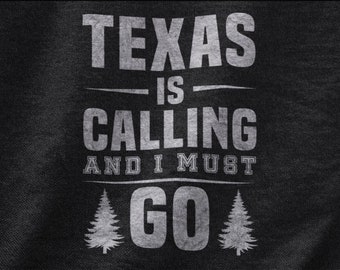 May include: A black and white graphic design with the text "Texas is calling and I must go" with two stylized pine trees on either side of the word "go".