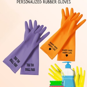 May include: Two pairs of rubber gloves with personalized text. One pair is purple with the text "This too shall pass". The other pair is orange with the text "Happy wife happy life".