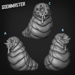 May include: Three different views of a grey, 3D printed, segmented, worm-like creature with a dripping, viscous substance coming from its mouth. The creature has a series of small, pointed protrusions around its mouth.