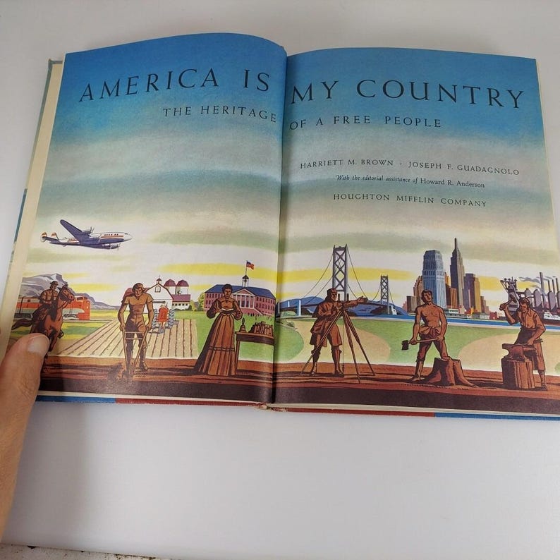 Puede incluir: Un libro abierto titulado "America is My Country: The Heritage of a Free People" de Harriett M. Brown y Joseph F. Guadagnolo. La portada del libro presenta ilustraciones de personas trabajando en diversas industrias, incluyendo la agricultura, la construcci&oacute;n y la manufactura.