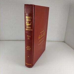 May include: A red leather-bound book titled "Page's Ohio Revised Code Annotated" with the volume number "55" and the subject "Roads, Highways, Bridges".