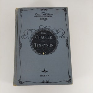 May include: A blue book with the title "From Chaucer to Tennyson" and the text "The Chautauqua Literary & Scientific Circle" on the cover. The book is by Beers.