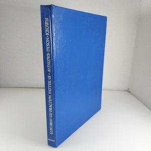 May include: A blue hardcover book with the title "Electron Diffraction Patterns - Andrews - Dyson - Keown" printed in gold on the spine.