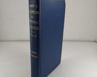 May include: A navy blue hardcover book, "Alden's Cyclopedia of Universal Literature, Vol. 5," with gold lettering. The book is standing upright, showcasing its spine. The book's title and author are visible.