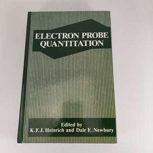 May include: A green book with the title "Electron Probe Quantitation" and the text "Edited by K.F.J. Heinrich and Dale E. Newbury".