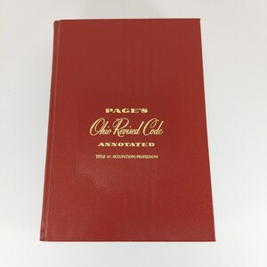 May include: A red hardcover book titled "PAGE'S Ohio Revised Code ANNOTATED TITLE 47: OCCUPATIONS-PROFESSIONS"
