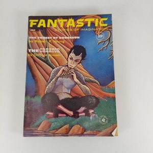 May include: A vintage July 1957 issue of Fantastic Stories of Imagination magazine featuring a colorful cover illustration of a creature with horns and a tail playing a flute. The cover text reads "The Forest of Unreason" by Robert F. Young and "The Creator" by Clifford Simak.