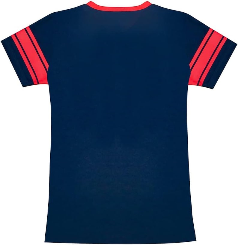 May include: A navy blue t-shirt with red and white stripes on the sleeves.