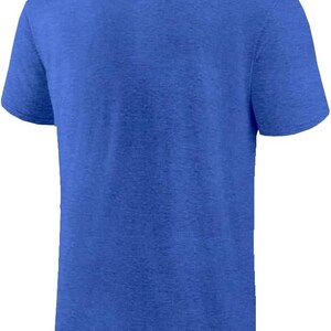 May include: A solid royal blue short-sleeved t-shirt made of a soft, textured fabric.