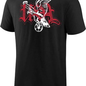 May include: Black t-shirt with a red and white graphic of an eagle holding a soccer ball with the word "USA" in a stylized font.