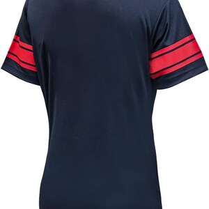 May include: A navy blue short-sleeved t-shirt with red stripes on the sleeves.
