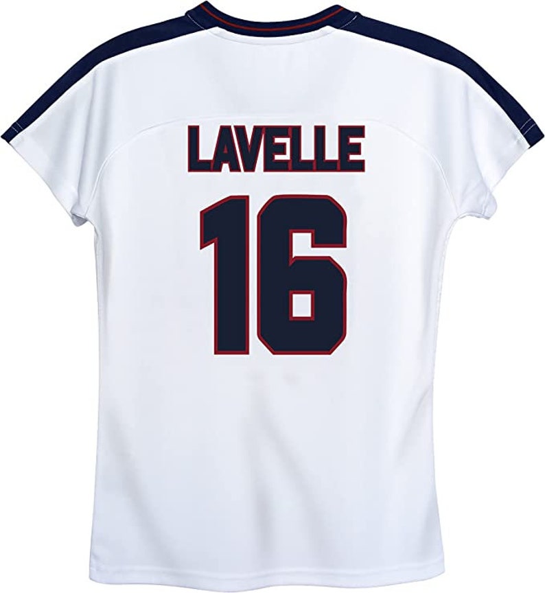 May include: White soccer jersey with navy blue and red trim. The back of the jersey has the name "LAVELLE" and the number "16" printed in navy blue with a red outline.