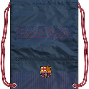 May include: A blue drawstring bag with the word "BARÇA" in red and blue lettering. The bag has a small zippered pocket and a red and blue FC Barcelona logo.
