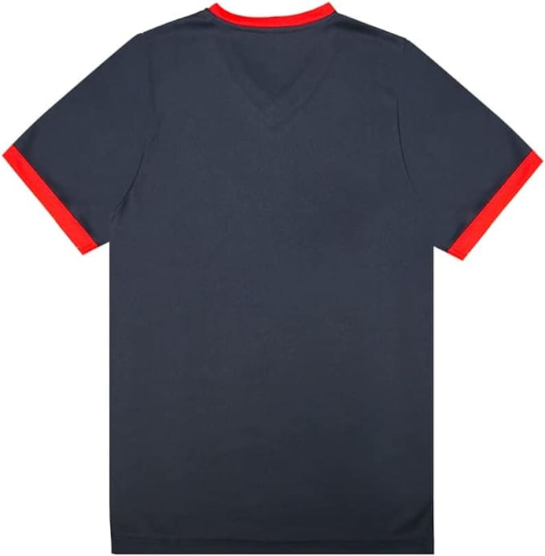May include: A navy blue t-shirt with red trim around the collar and sleeves.