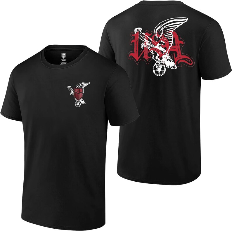 May include: Black t-shirt with a white eagle graphic on the front and a larger white eagle graphic on the back. The eagle graphic includes the text "USA" and a soccer ball.