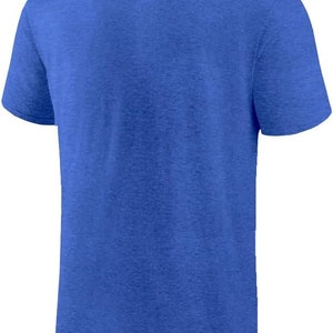 May include: A royal blue short-sleeved t-shirt made of a soft, textured fabric.