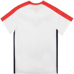 May include: White athletic t-shirt with red shoulder accents and a navy blue side stripe. The shirt has a crew neck and a subtle design on the back. This sports apparel is suitable for various activities.