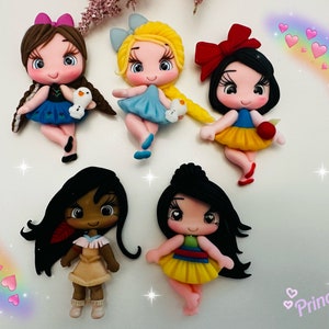 May include: A collection of six princess figurines, each with unique hairstyles and outfits. The figurines are in various poses, with vibrant colors and detailed features. The word "Princess" is written in a cursive font.