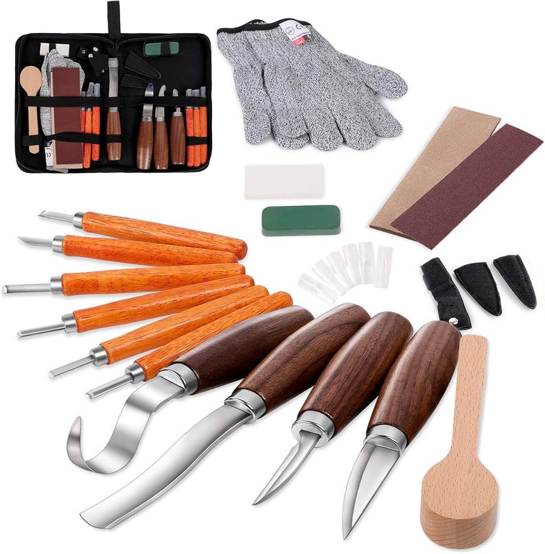 May include: A wood carving set with various tools, including knives with wooden handles, a spoon, and a protective glove. The set also includes sharpening stones, sandpaper, and a carrying case. The tools have stainless steel blades.