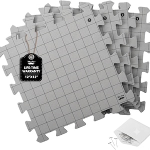 May include: A set of interlocking gray foam floor tiles featuring a black grid pattern. Each tile measures 12 inches by 12 inches. A black tag attached to the tiles displays the text Mr. Pen, LIFE-TIME WARRANTY, and 12"X12". Includes T-pins.