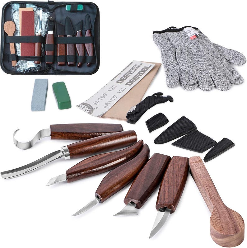 May include: A wood carving set with various knives, a spoon, sharpening stones, sandpaper, and protective gloves. The knives have wooden handles and stainless steel blades. The set includes a zippered carrying case for storage and transport.
