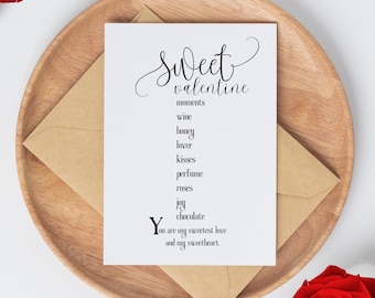 May include: A white card with black text that reads "Sweet Valentine" and lists words like "moments", "wine", "honey", "lover", "kisses", "perfume", "roses", "joy", and "chocolate". The card also includes the text "You are my sweetest love and my sweetheart."