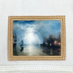 May include: A framed painting of a seascape with ships at sea under a full moon. The painting is in a gold frame with a white mat.