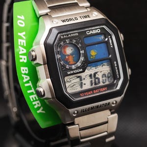 Modified Casio AE-1200 'SnoopMoon' colorful LCD and polished stainless steel bracelet