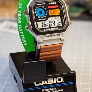 Modified watch based on Casio AE1200 Color filtered LCD and magnetic loop strap (read the description for information about the variants)