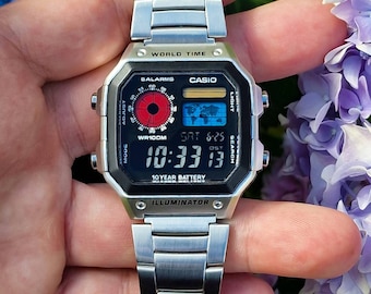 Modified watch based on Casio AE-1200, colorful polarised LCD, hydromod case and polished stainless steel bracelet