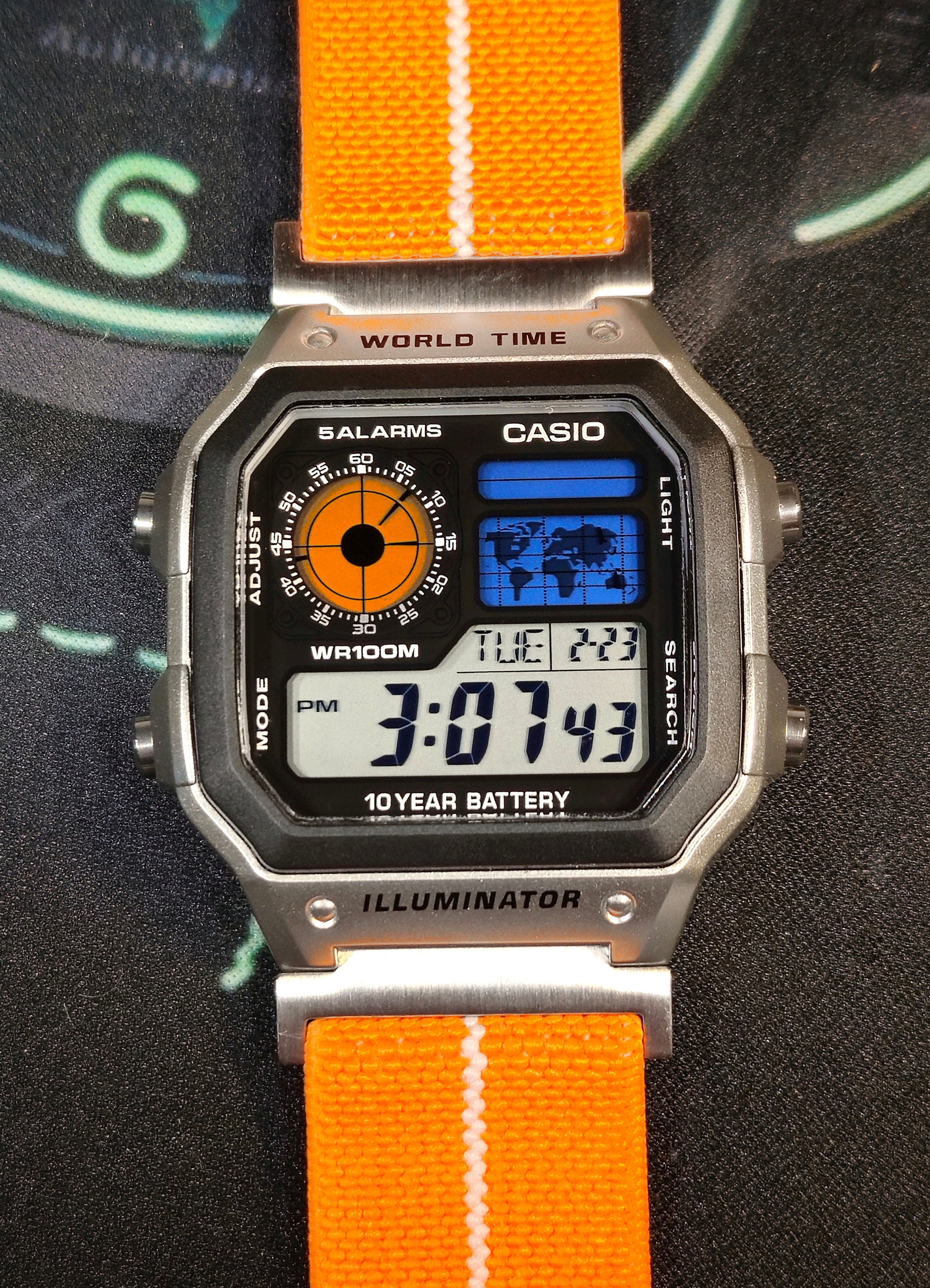 Custom Casio AE-1200 Watch: Silver Case, Orange Elastic Strap