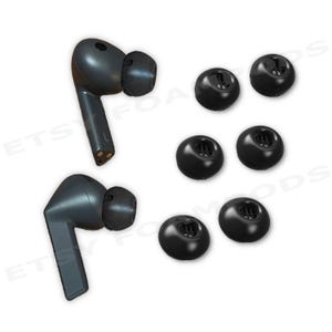 May include: A pair of dark gray wireless earbuds with black ear tips, alongside six additional black ear tips. The earbuds have a sleek, modern design, perfect for listening to music or taking calls.