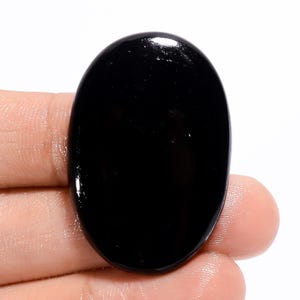 Cristal de turmalina negra / Piedra de turmalina negra / Cristal de turmalina / Piedras de protección / Forma ovalada Tamaño 38X26X5 mm Peso 58 quilates