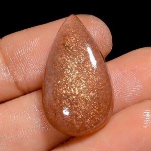 Pietra di luna naturale pesca a forma di pera cabochon sciolto per la creazione di gioielli 19 carati 26X15X5 mm (pietra come da foto)