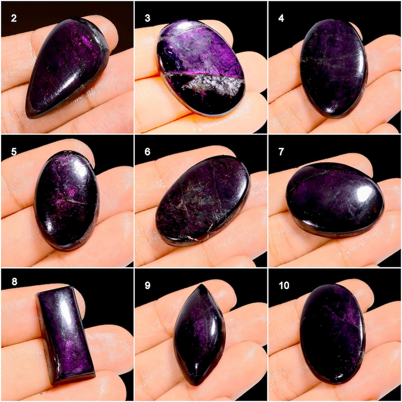 May include: A collection of polished, deep purple sugilite gemstones in various shapes. The stones display a range of forms, including oval, teardrop, and rectangular, with a glossy finish. The color varies from dark violet to nearly black, with some stones showing lighter purple veining.