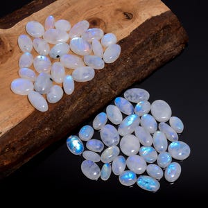 Lot de 100 pierres précieuses naturelles en forme de cabochon de pierre de lune arc-en-ciel de forme ovale de 15 à 22 mm pour la fabrication de bijoux (Pierre comme image)