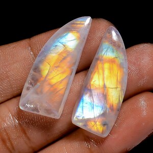 Paire de pierres précieuses naturelles en forme de cabochon avec pierre de lune arc-en-ciel pour faire des boucles d'oreilles, 36 carats 28 x 11 x 4 mm (la paire comme sur la photo)