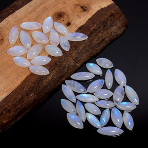 Lot de 50 pierres précieuses naturelles en forme de marquise, cabochon de pierre de lune arc-en-ciel, 19-29 mm, lot de cristal de pierre de lune pour la fabrication de bijoux (Pierre comme image)