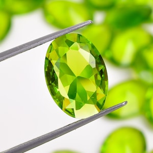 Piedras de cristal de peridoto talladas en forma ovalada con punta en punta, para hacer joyas, tamaño 10 x 14 mm (piedra como en la imagen)