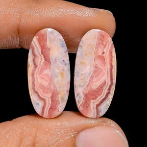 Paire de pierres précieuses en vrac en forme de cabochon de rhodochrosite naturelle de forme ovale pour la fabrication de boucles d'oreilles 24 carats. 21 x 9 x 3 mm (la paire comme sur la photo)