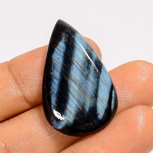 Naturalny niebieski tygrysie oko kamień szlachetny kształt gruszki niebieski tygrysie oko kamień duży owalny niebieski tygrysie oko kaboszon 31X20X5 mm rozmiar 24 karatowy kaboszon (jak na zdjęciu)