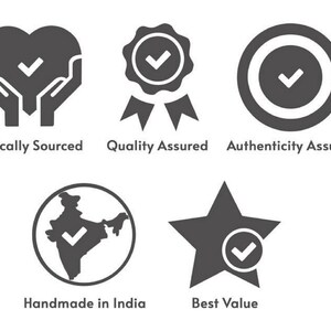 May include: A collection of five gray icons with white text. The icons include a heart with hands, a badge, a circle, a map of India, and a star. The text reads: Ethically Sourced, Quality Assured, Authenticity Assured, Handmade in India, and Best Value.