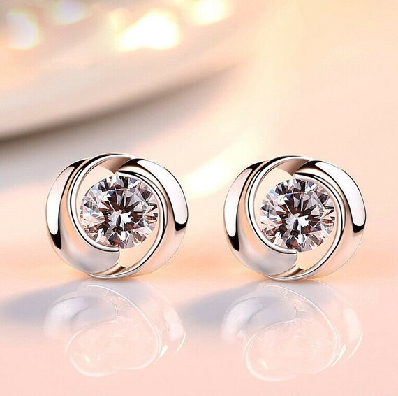 Tension set diamond earrings shop